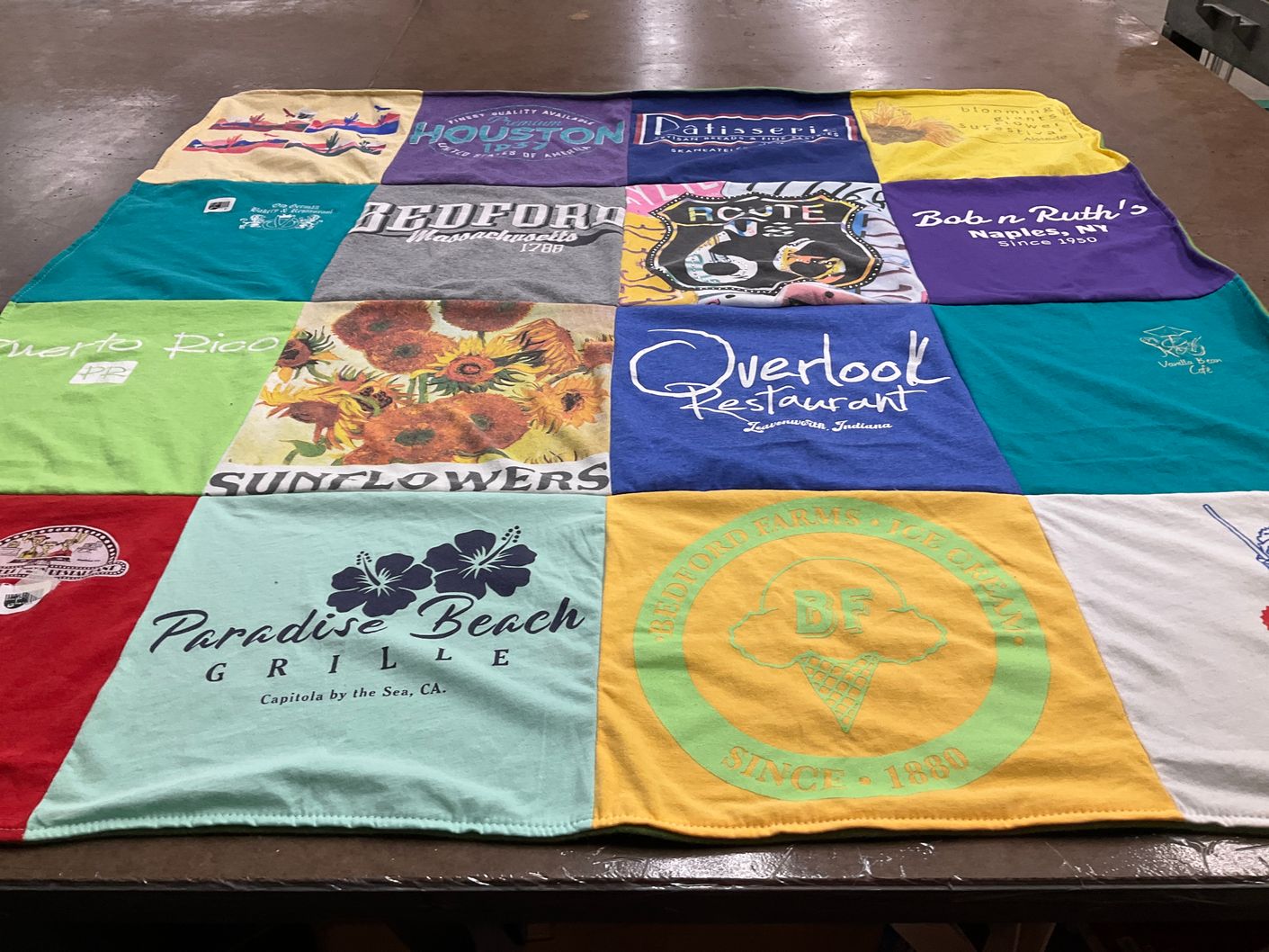 T-shirt quilt with culinary, travel themes by Christy from MA