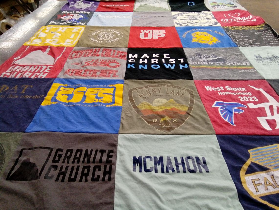T-shirt quilt featuring west sioux community school by Jennifer from IA
