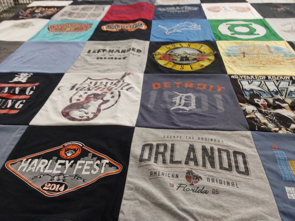 T-shirt quilt with music, motorcycles themes by Mary from MI
