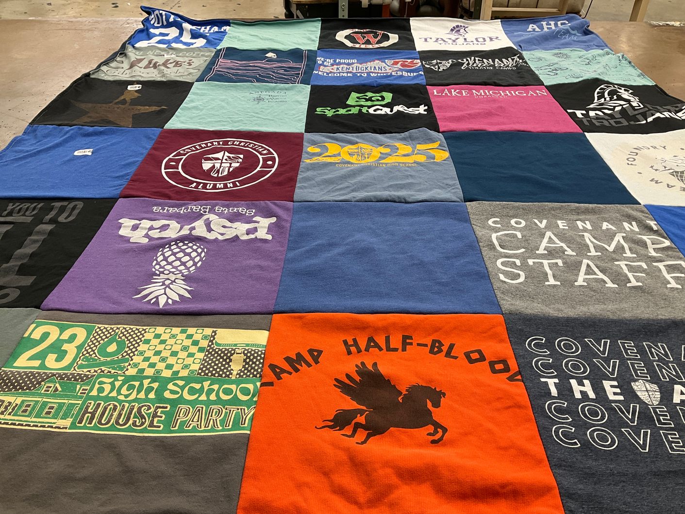 T-shirt quilt with camping, education themes by Marisa from IN