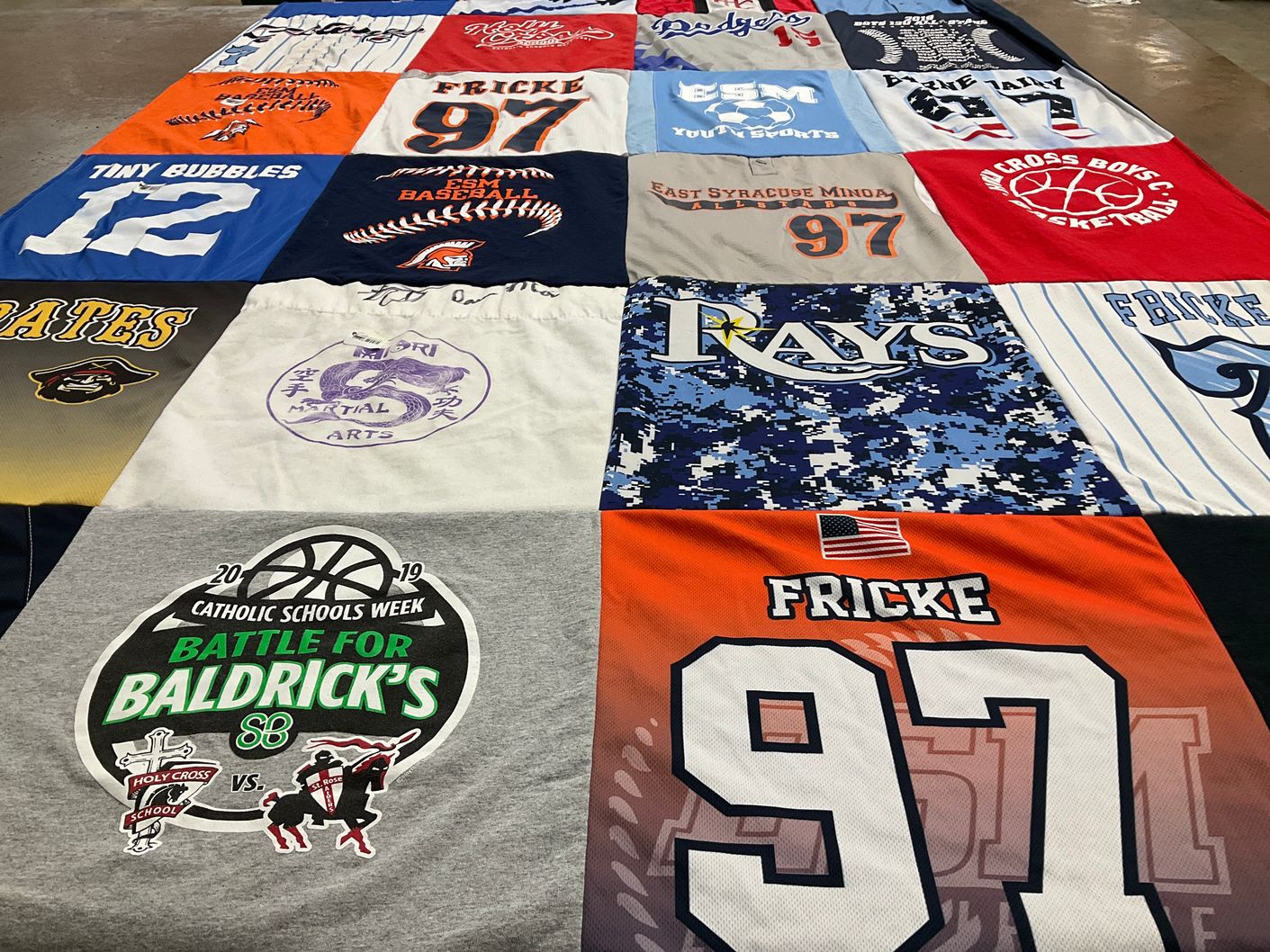 T-shirt quilt featuring east syracuse minoa basketball, holy cross school basketball by Marianne from NY