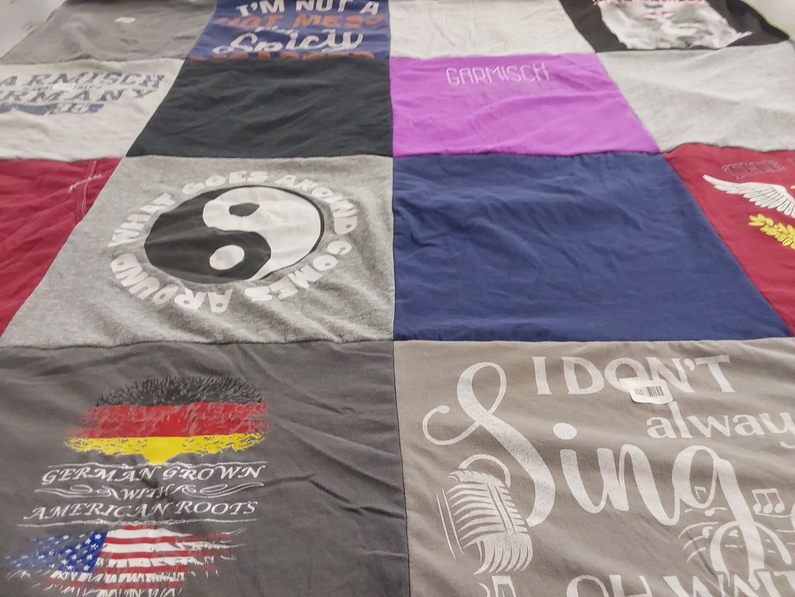 T-shirt quilt with music, travel themes by Brian from TX