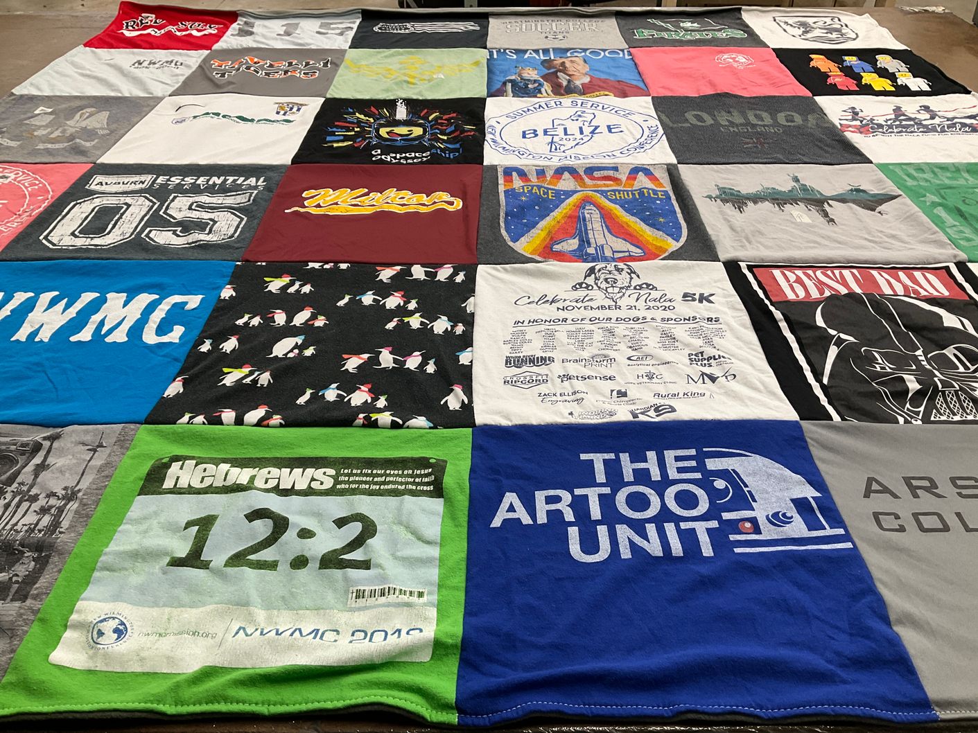 T-shirt quilt with running, education themes by Justin from CO