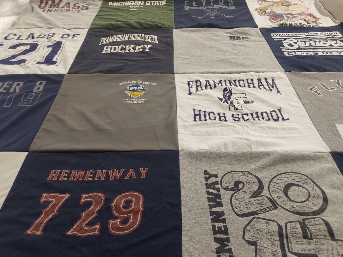 T-shirt quilt featuring flyers by Christina from MA