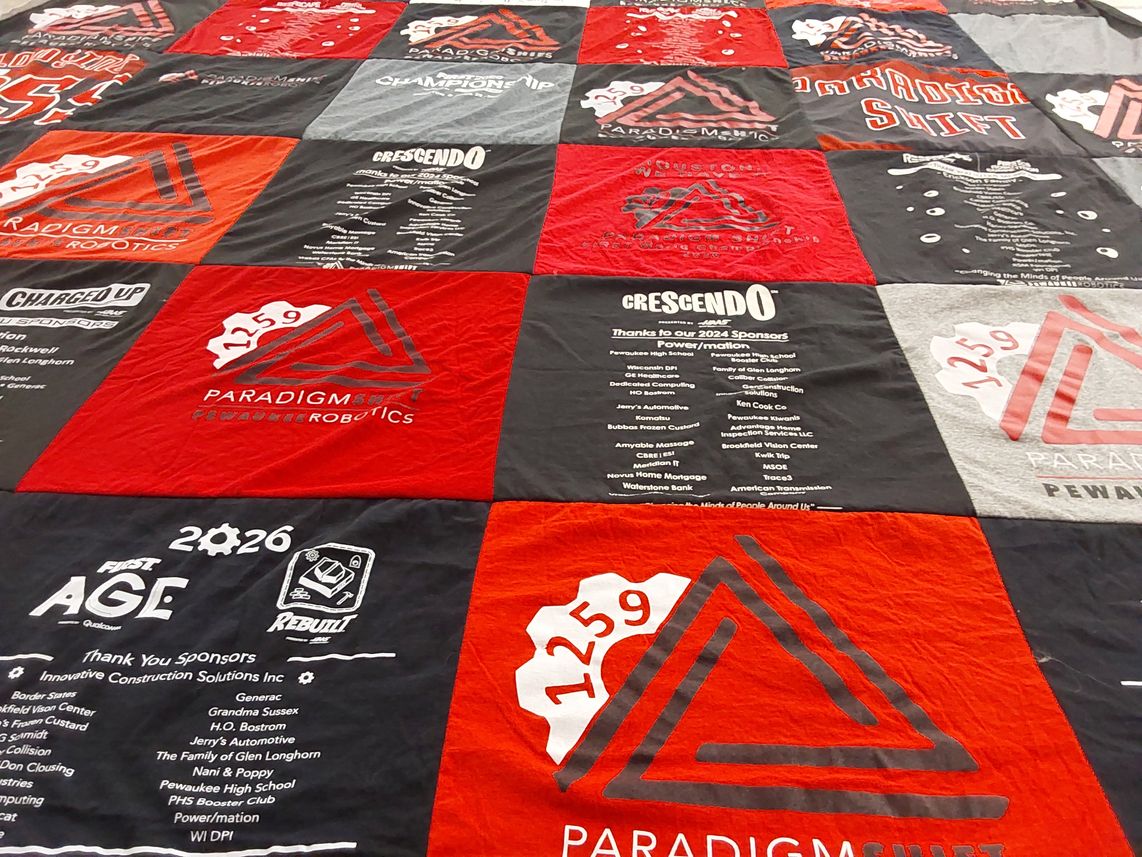 T-shirt quilt featuring paradigm shift by shelly from WI