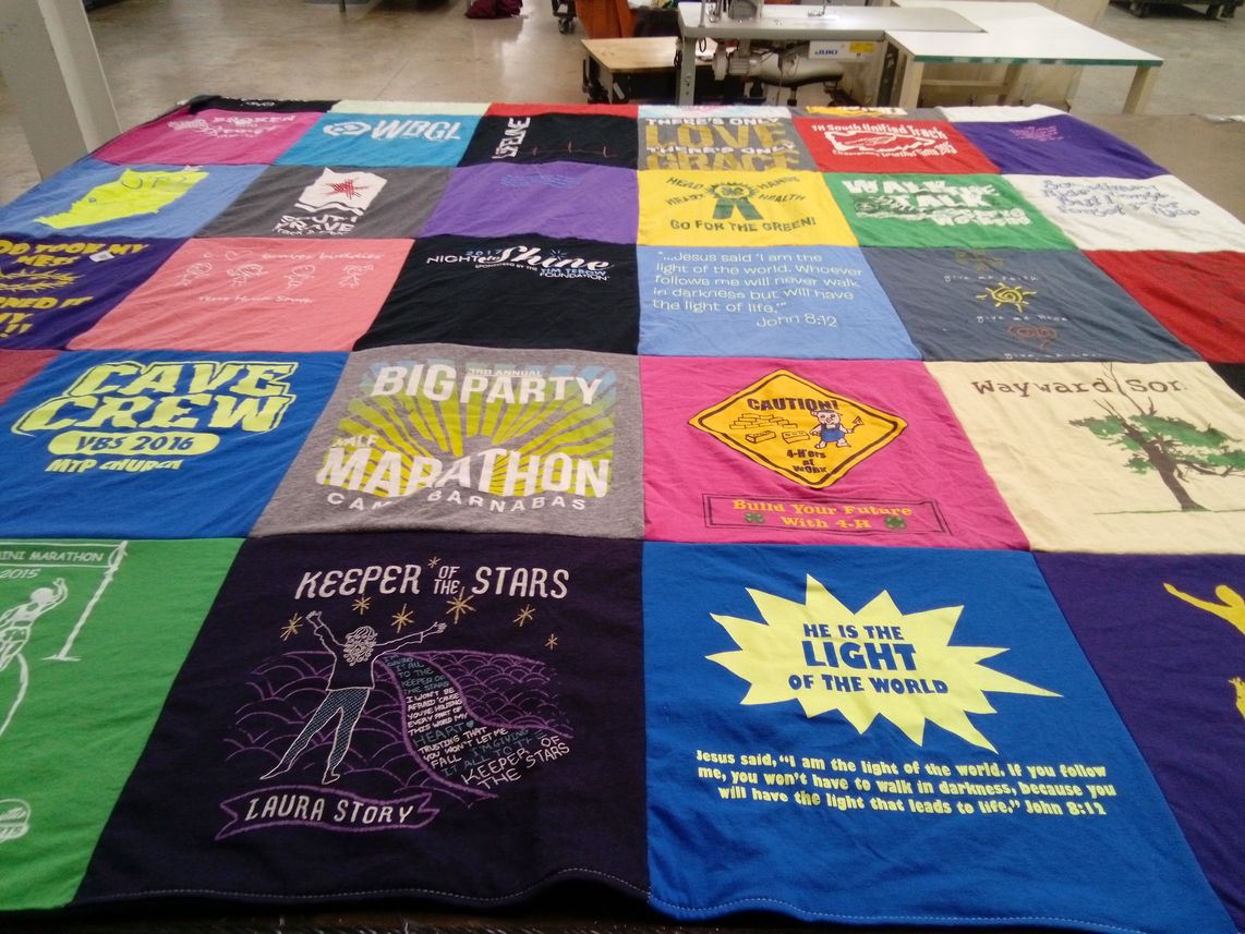 T-shirt quilt with religion, community service themes by Tammy from IN