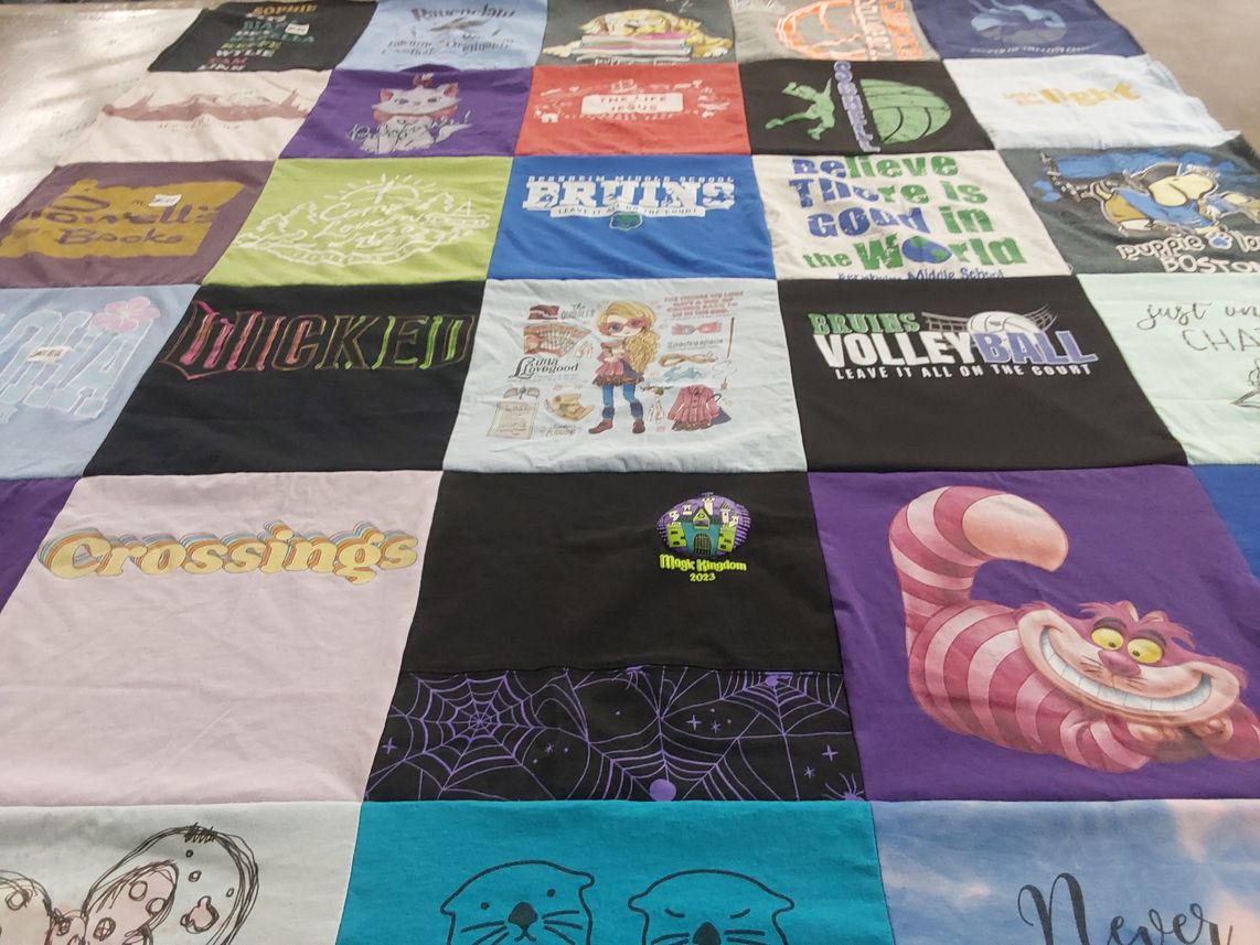 T-shirt quilt with theater, sports themes by Ashley from KY