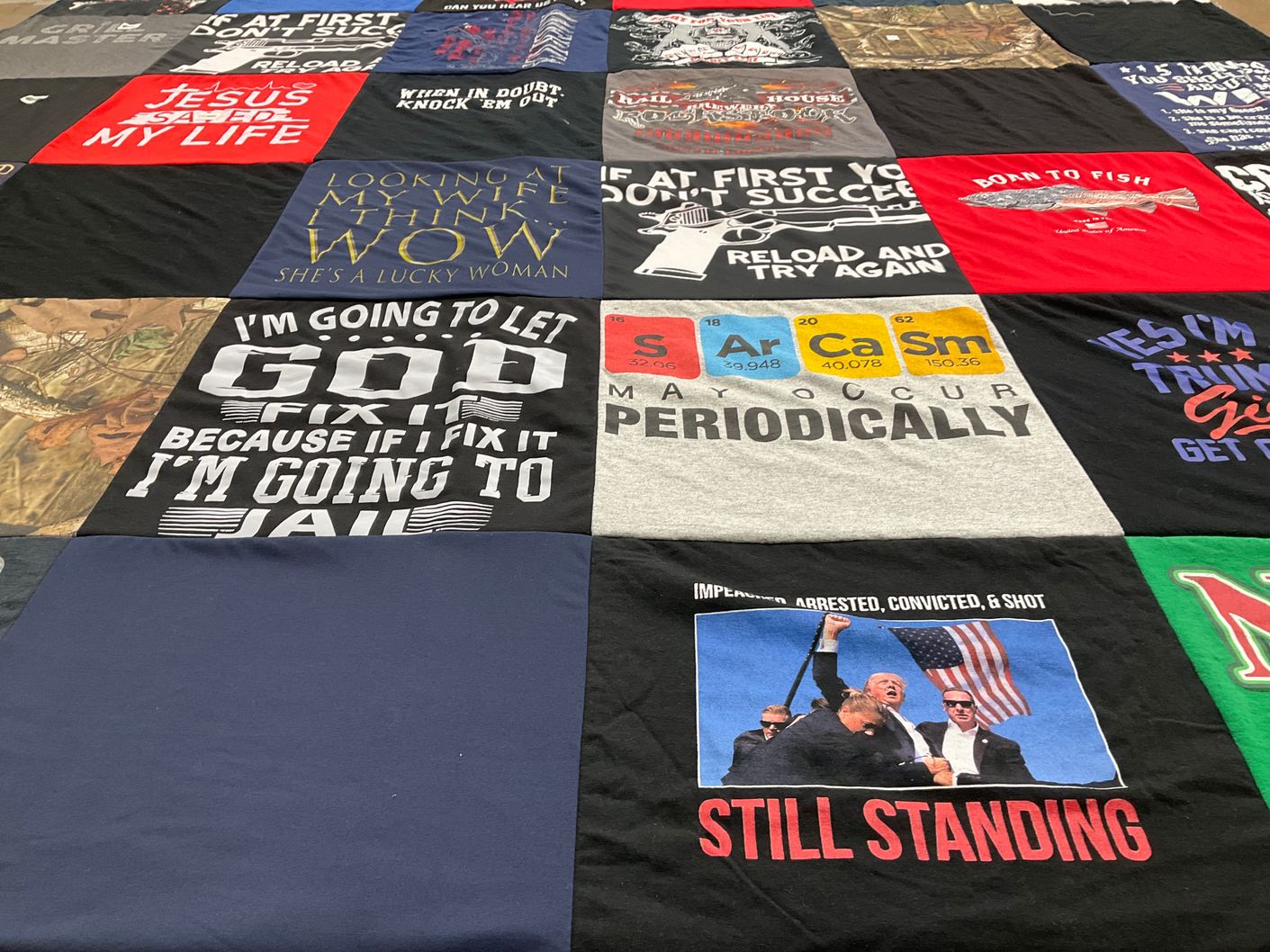 T-shirt quilt with fishing, religion themes by Wallace from NC