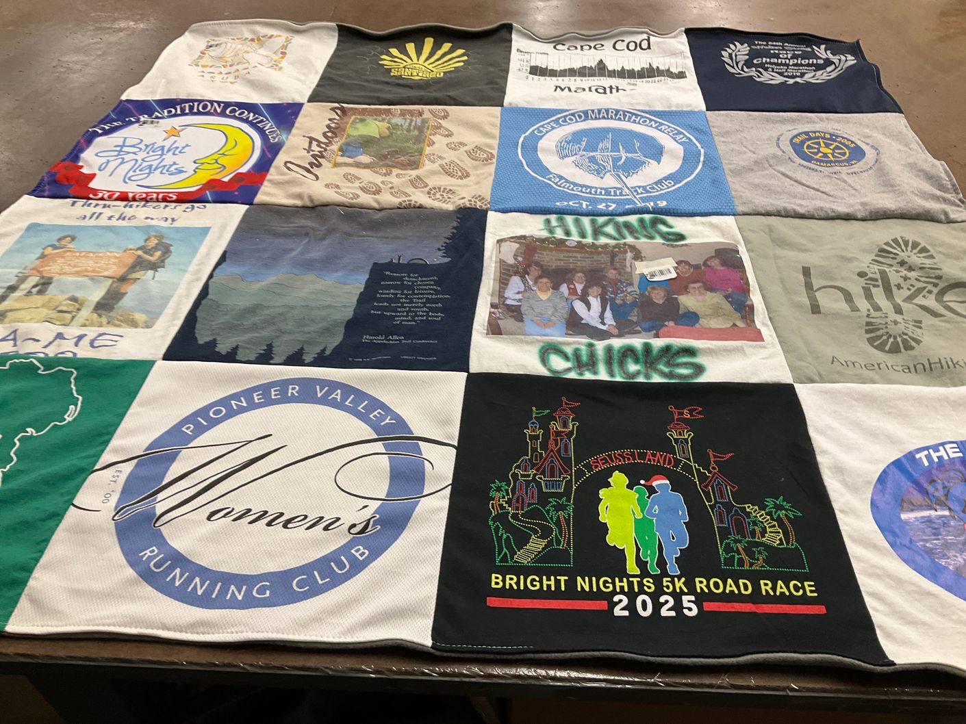 T-shirt quilt with running, hiking themes by Sharilyn from MA