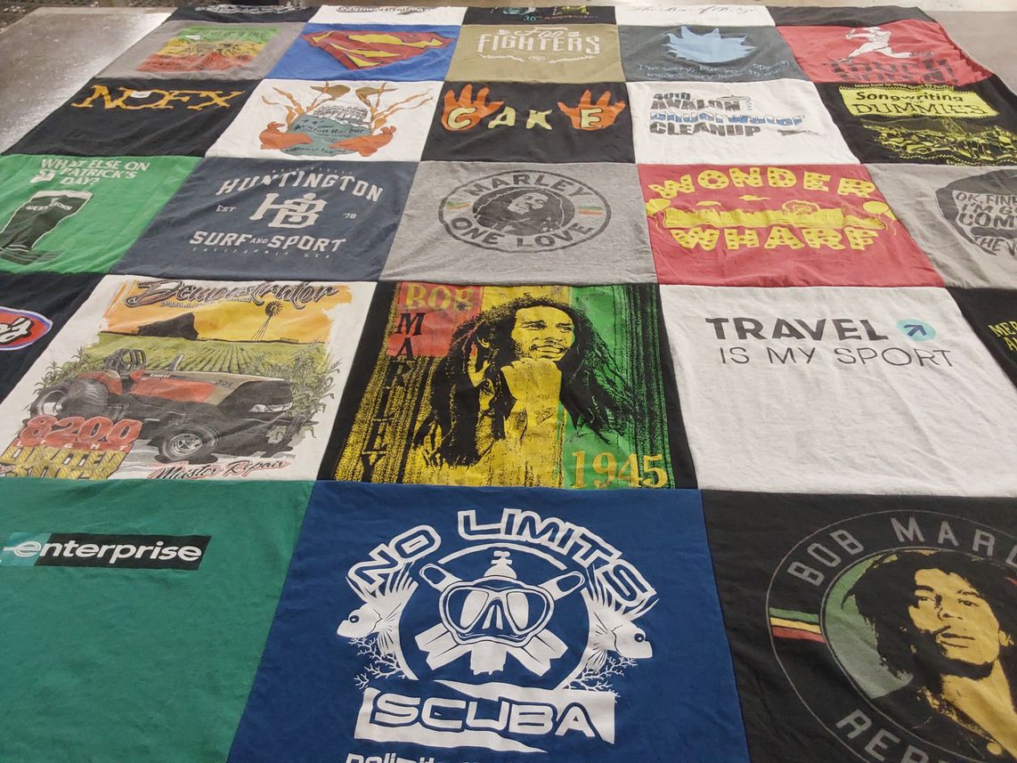 T-shirt quilt with music, travel themes by Christine from AZ