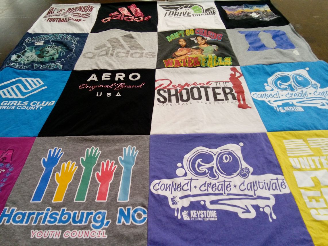 T-shirt quilt with community service, sports themes by Desiree from NC