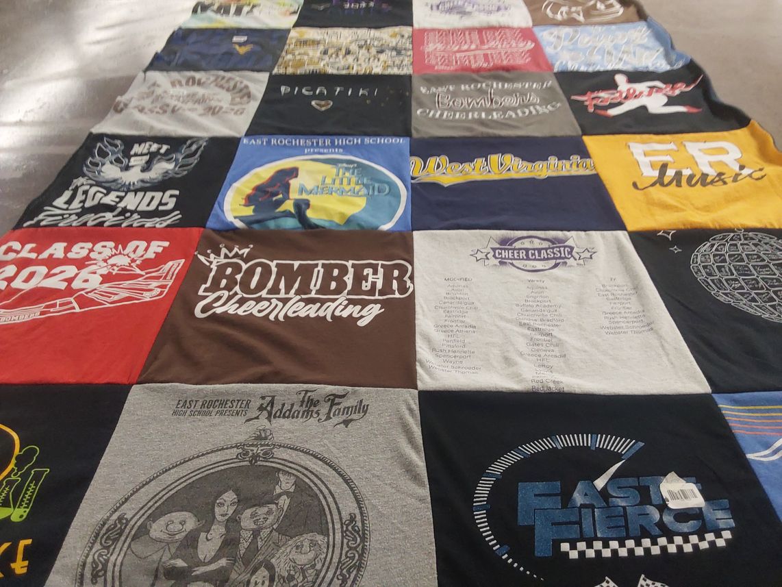 T-shirt quilt featuring bomber cheerleading by Kim from NY