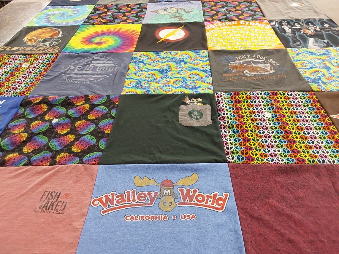 T-shirt quilt with music, sports themes by Peggy from ID