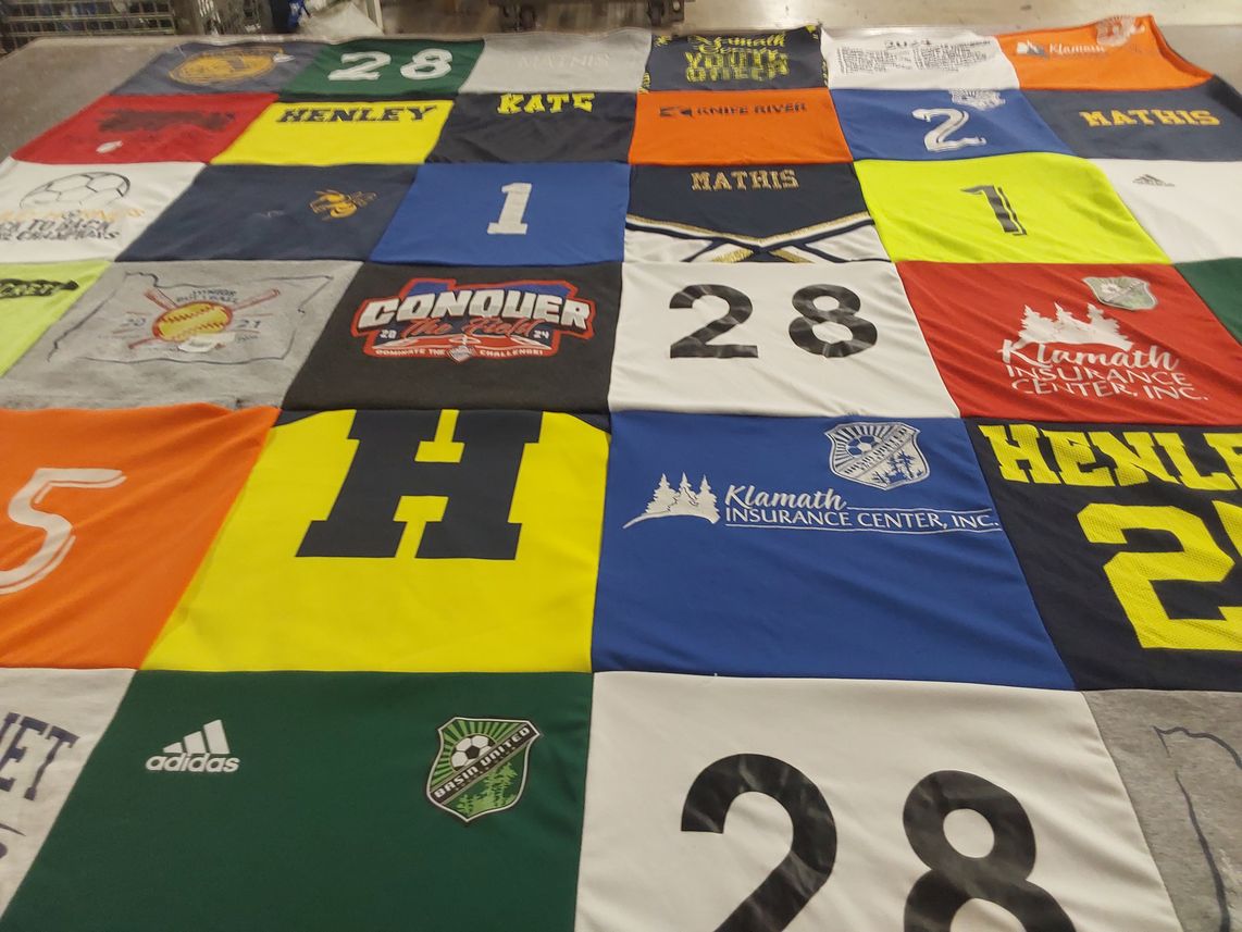 T-shirt quilt featuring heralds soccer team, mathis high school by Leslie from OR