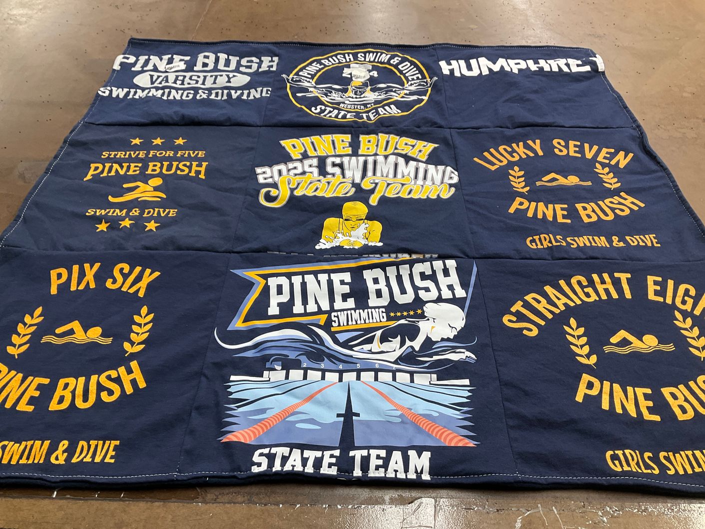 T-shirt quilt featuring pine bush swimming team by Dorothy from NY