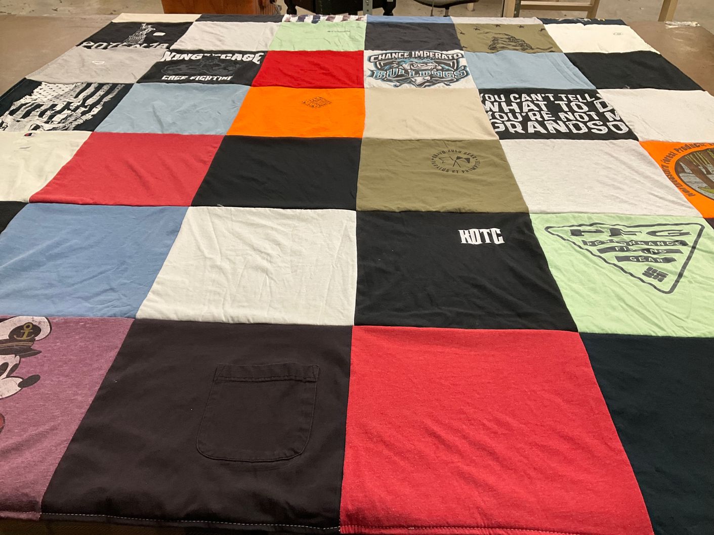 T-shirt quilt with sports, fishing themes by danielle from NJ