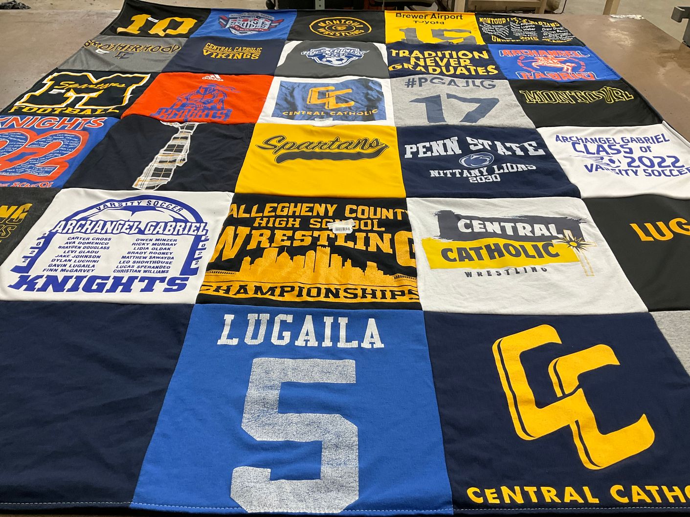 T-shirt quilt featuring central catholic wrestling, archangel gabriel knights by catherine from PA