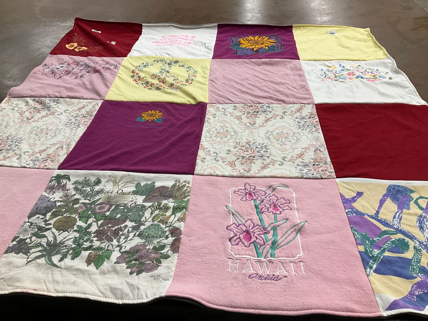 T-shirt quilt with gardening, flowers themes by Teresa from NC