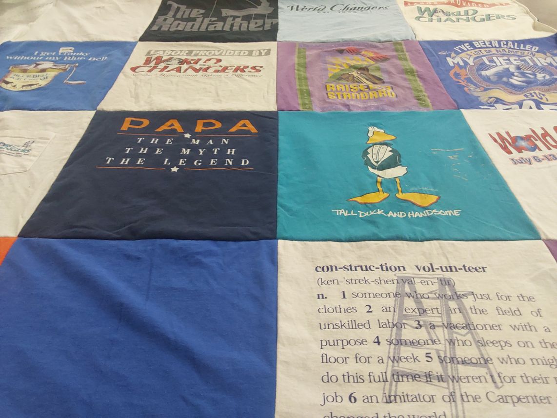 T-shirt quilt with volunteering themes by Renee from TX