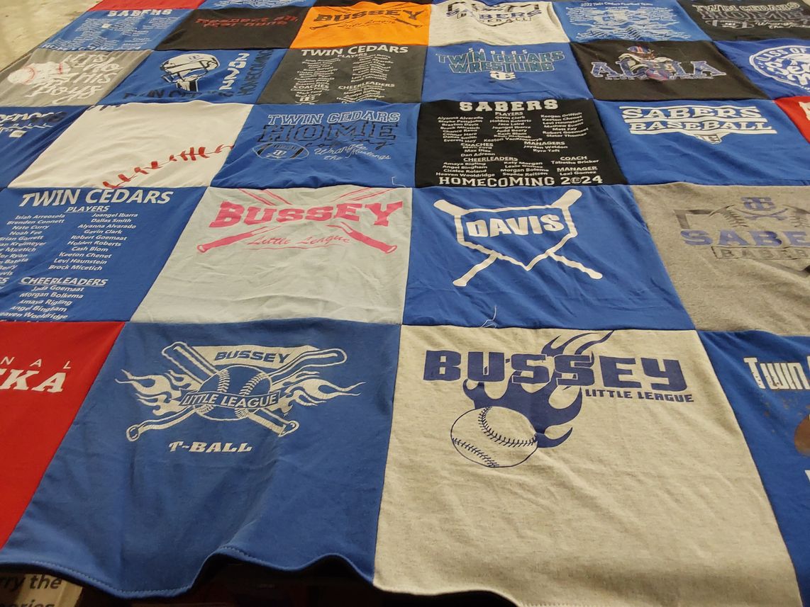 T-shirt quilt featuring twin cedars sabers, bussey little league by Jonathan from IA