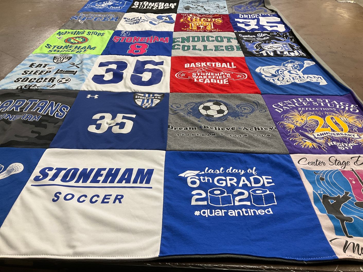 T-shirt quilt featuring stoneham soccer club, stoneham spartans by Julie from MA
