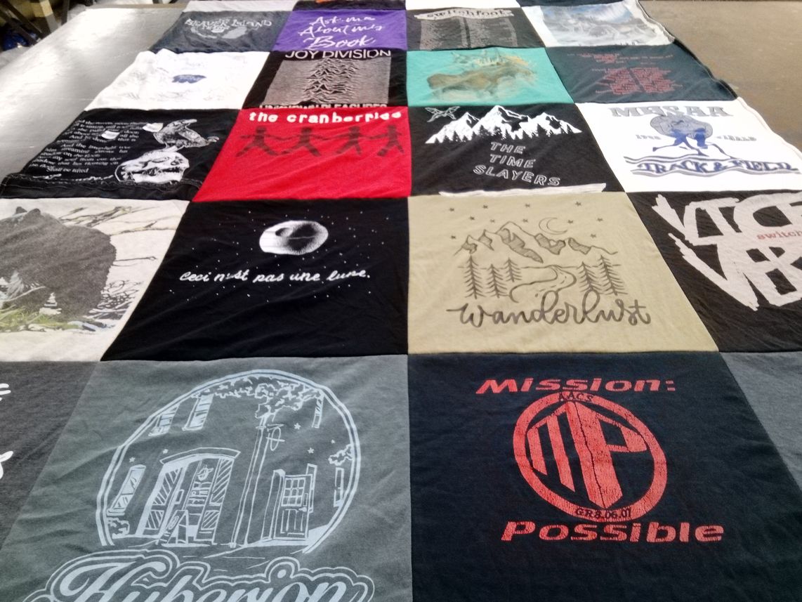 T-shirt quilt with music, hiking themes by Kayla from MI
