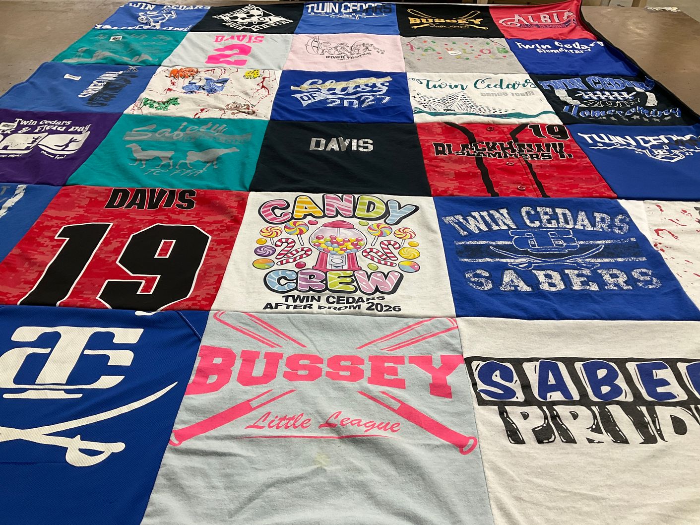 T-shirt quilt featuring twin cedars sabers, davis little league by Jonathan from IA