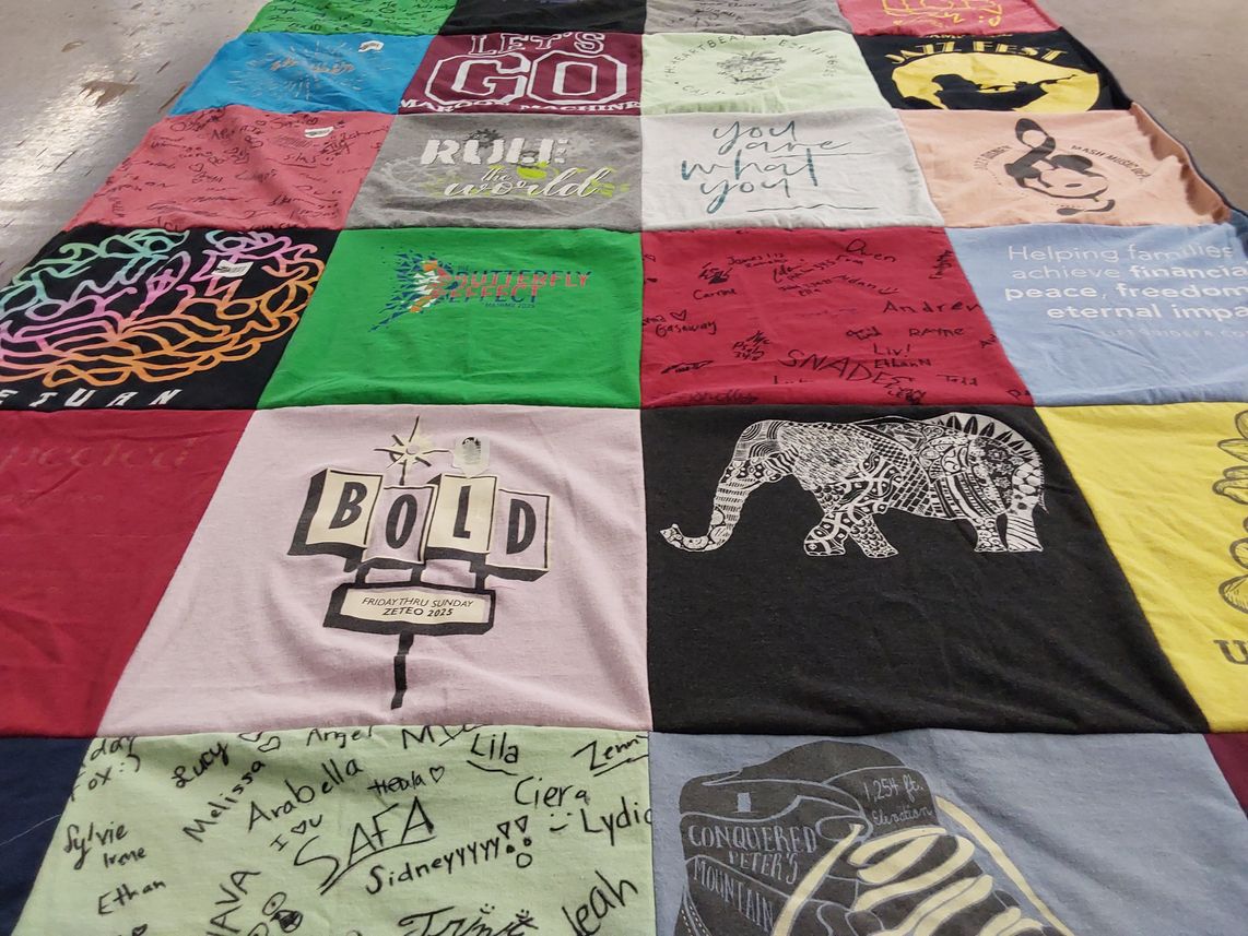 T-shirt quilt with music, community service themes by Rachel from PA