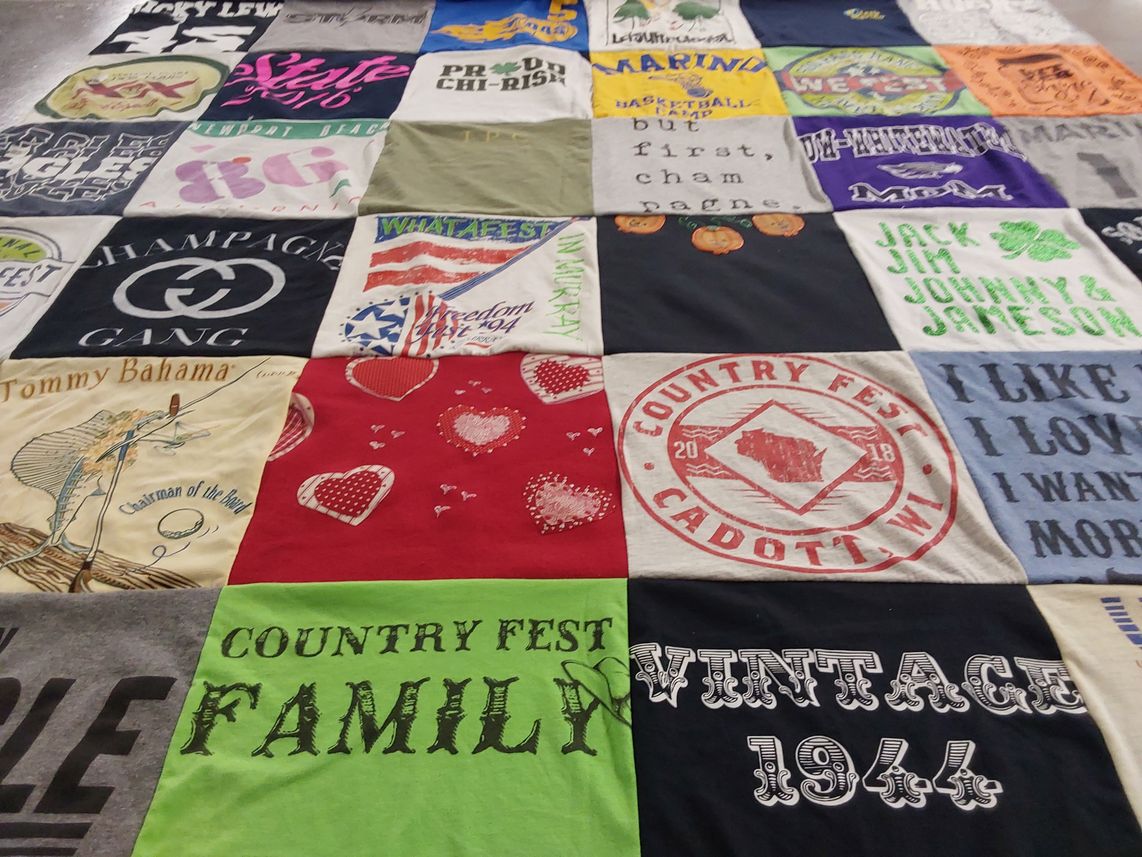 T-shirt quilt with country fest themes by Erika from IL