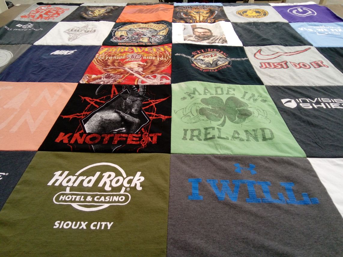 T-shirt quilt with music, motorcycles themes by Linda from IA