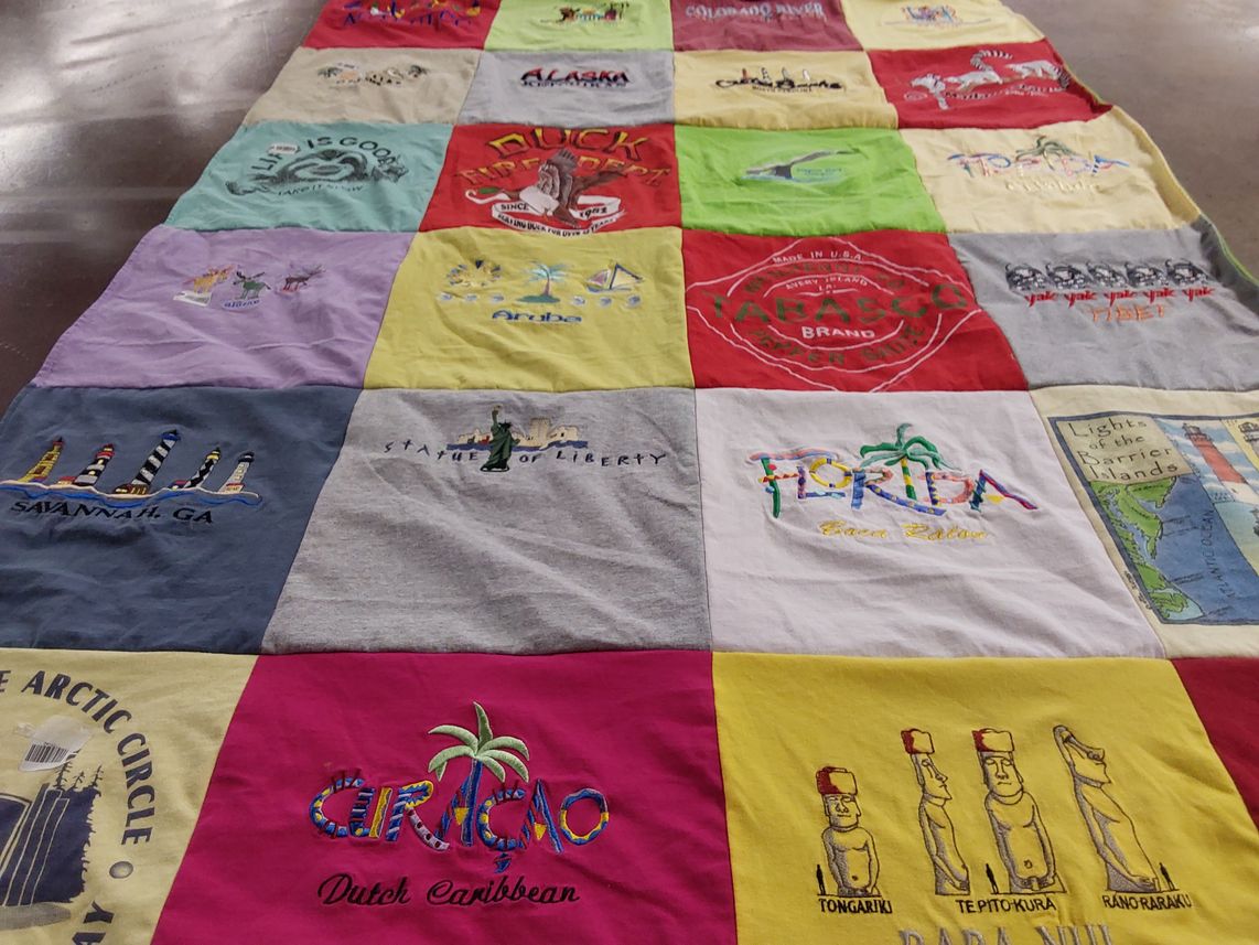 T-shirt quilt with travel, tourism themes by Linda from WA