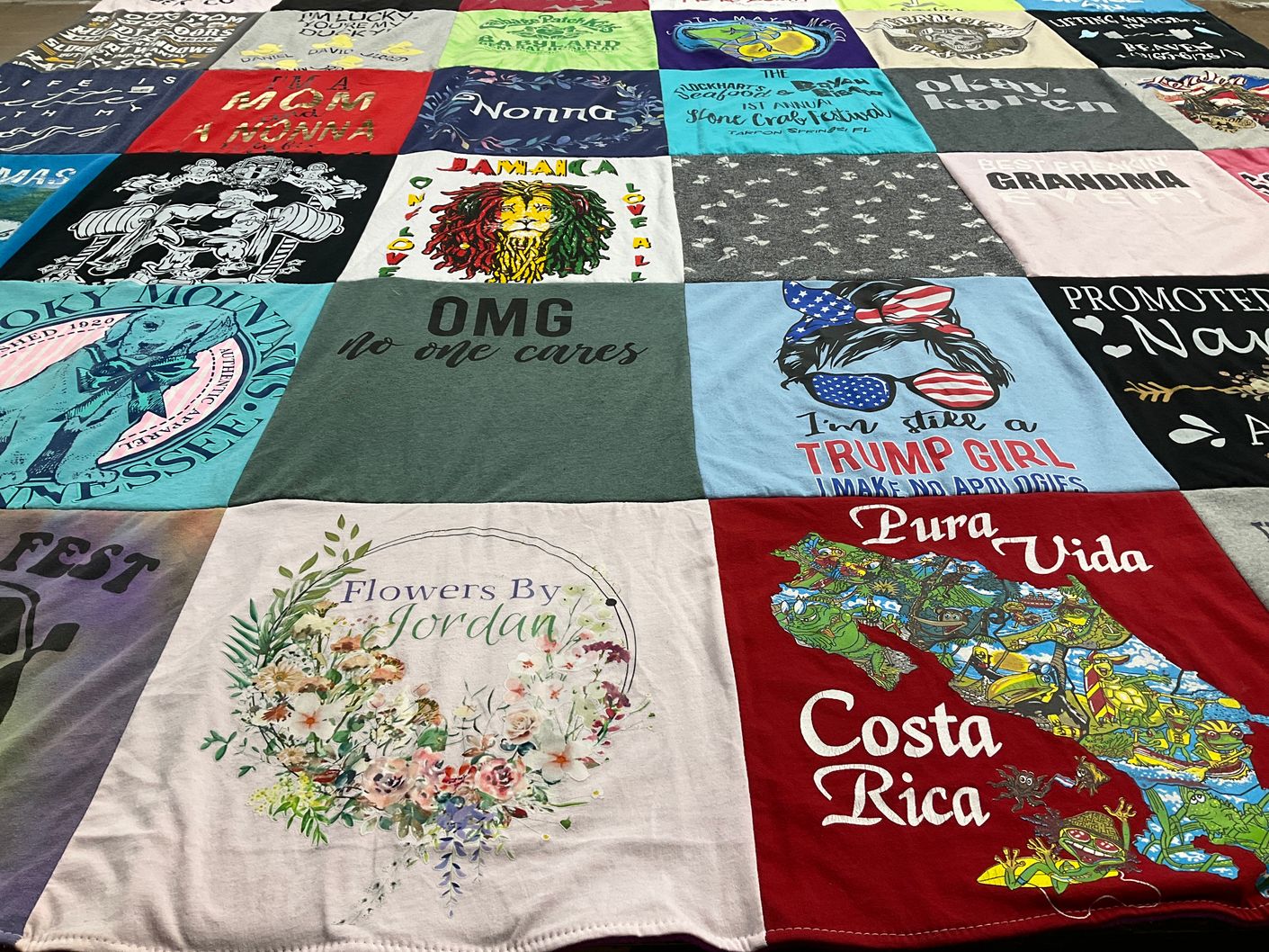 T-shirt quilt with family, travel themes by Donna from FL