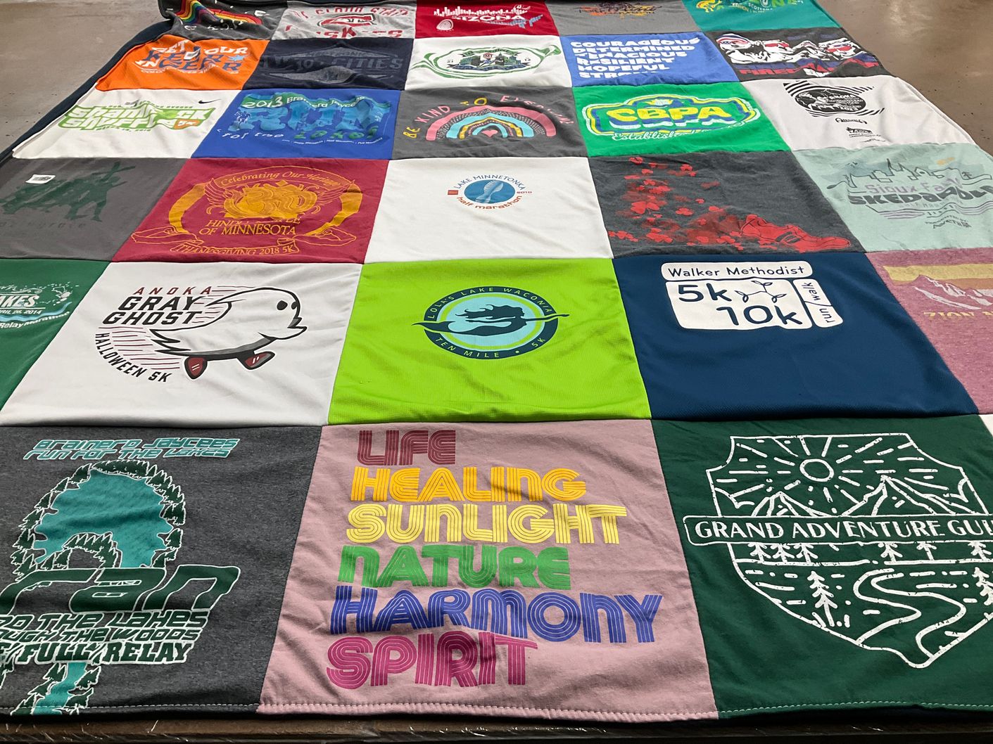 T-shirt quilt with running, hiking themes by Brad from MN