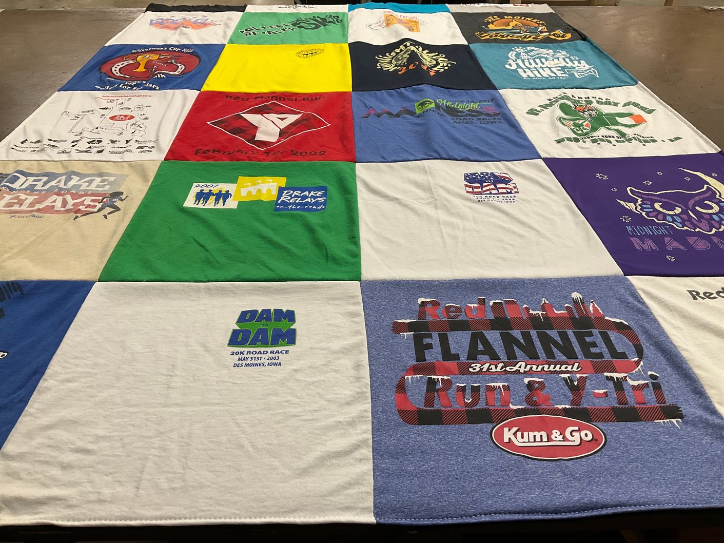T-shirt quilt with running, outdoor activities themes by Pam from IA