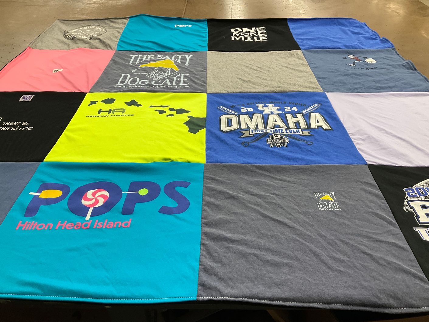 T-shirt quilt with athletics, cafe themes by Lynda from TN