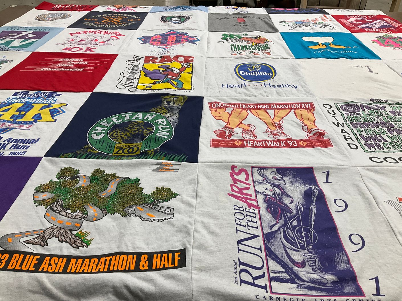 T-shirt quilt with running, sports themes by Debbie from OH