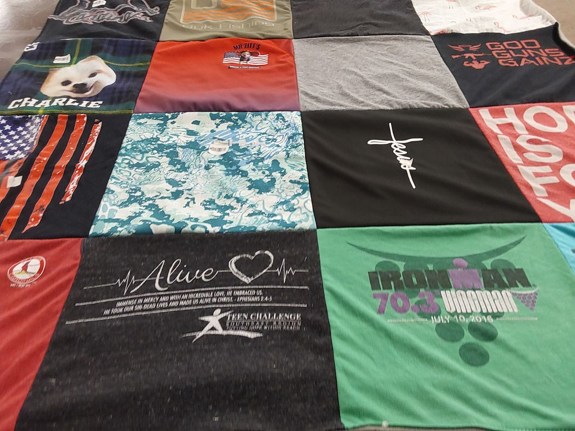 T-shirt quilt with fitness, charity themes by Christine from IL