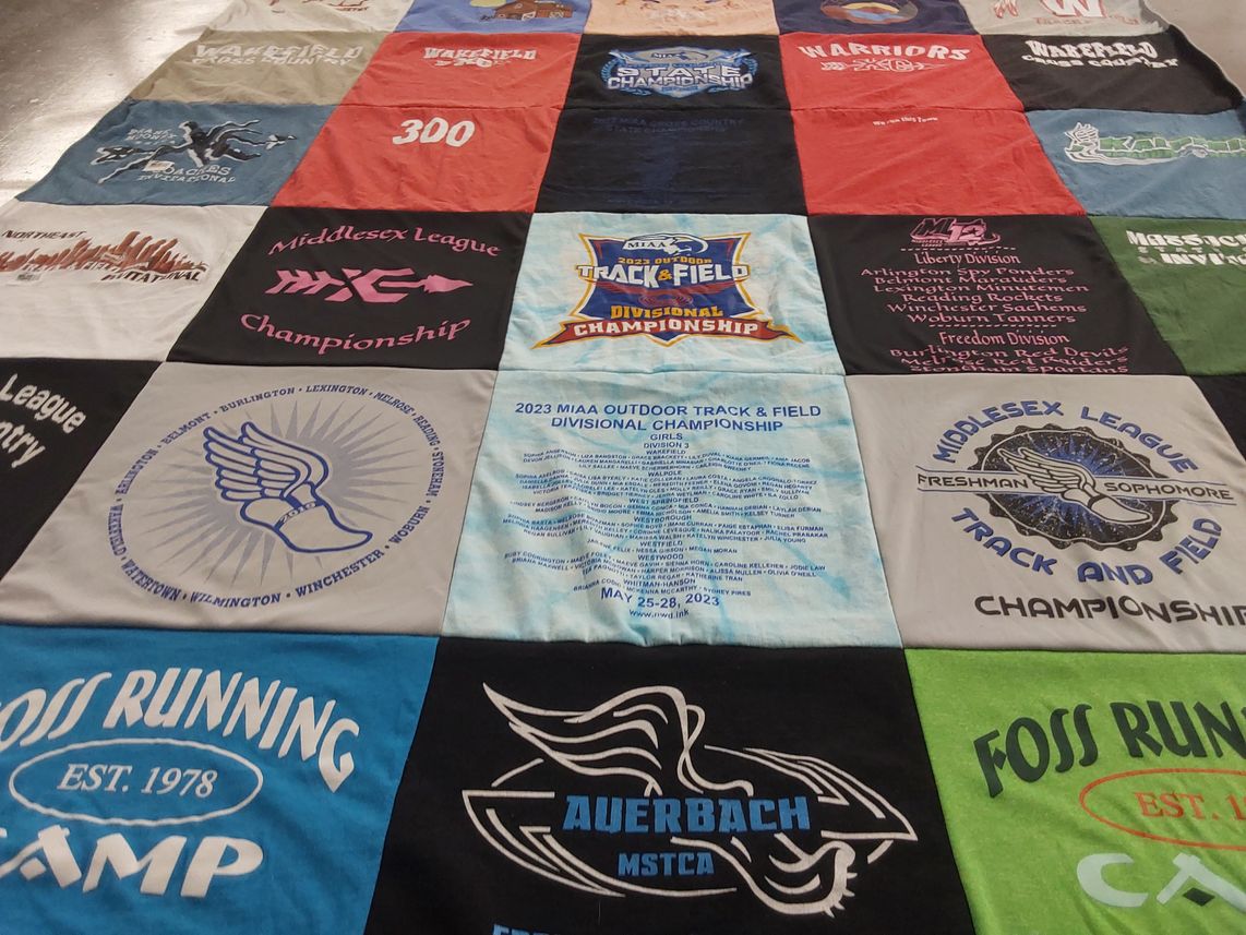 T-shirt quilt with track and field, running themes by amy from MA