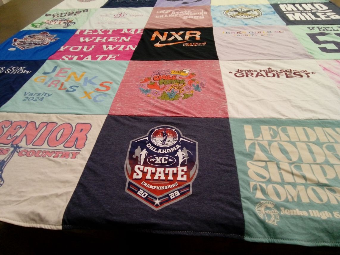 T-shirt quilt featuring jenks girls xc by Hilleri Keely from OK