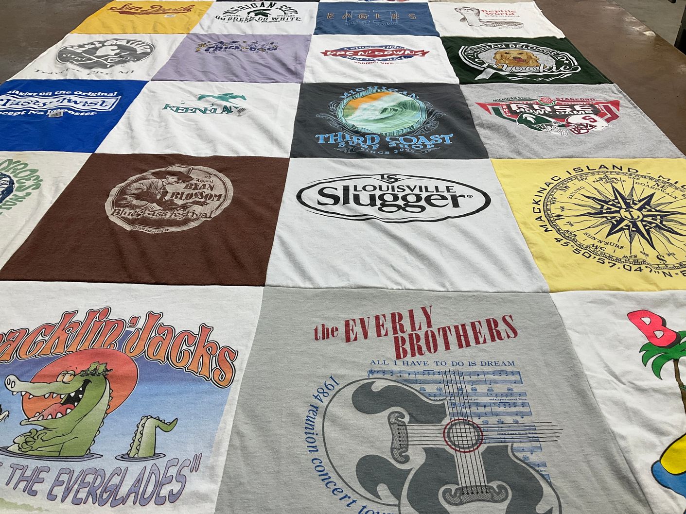T-shirt quilt with music, sports themes by Jeanne from MI
