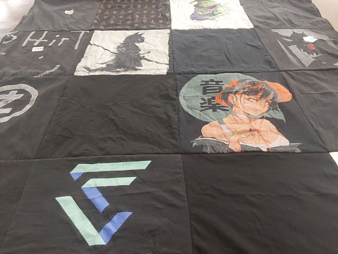 T-shirt quilt with anime, music themes by Tiffany from CA