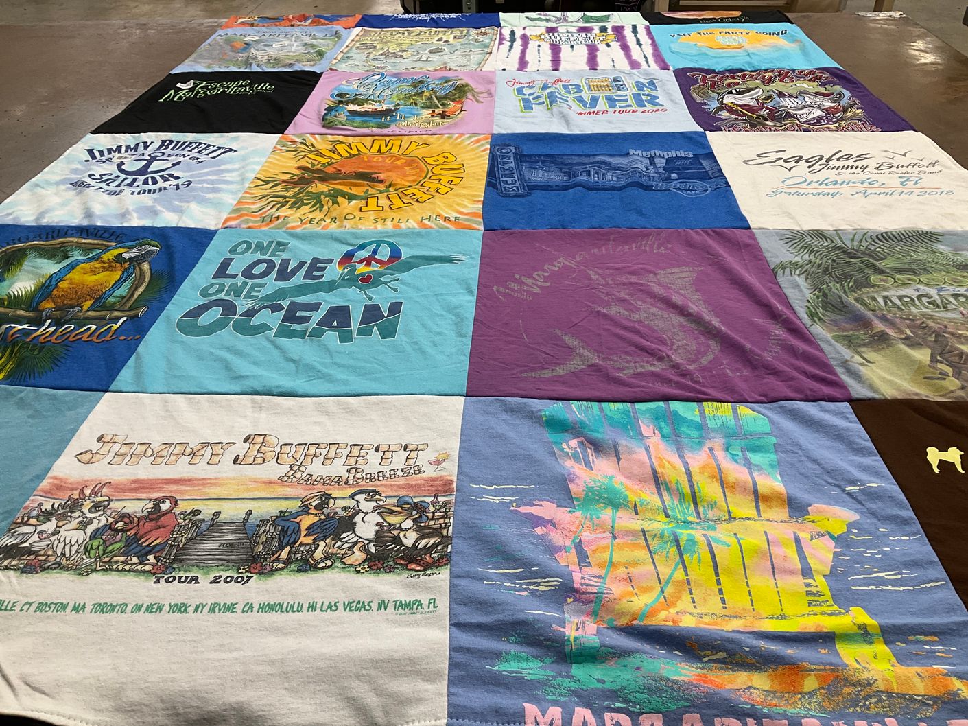 T-shirt quilt with music, beach themes by Linda from TN