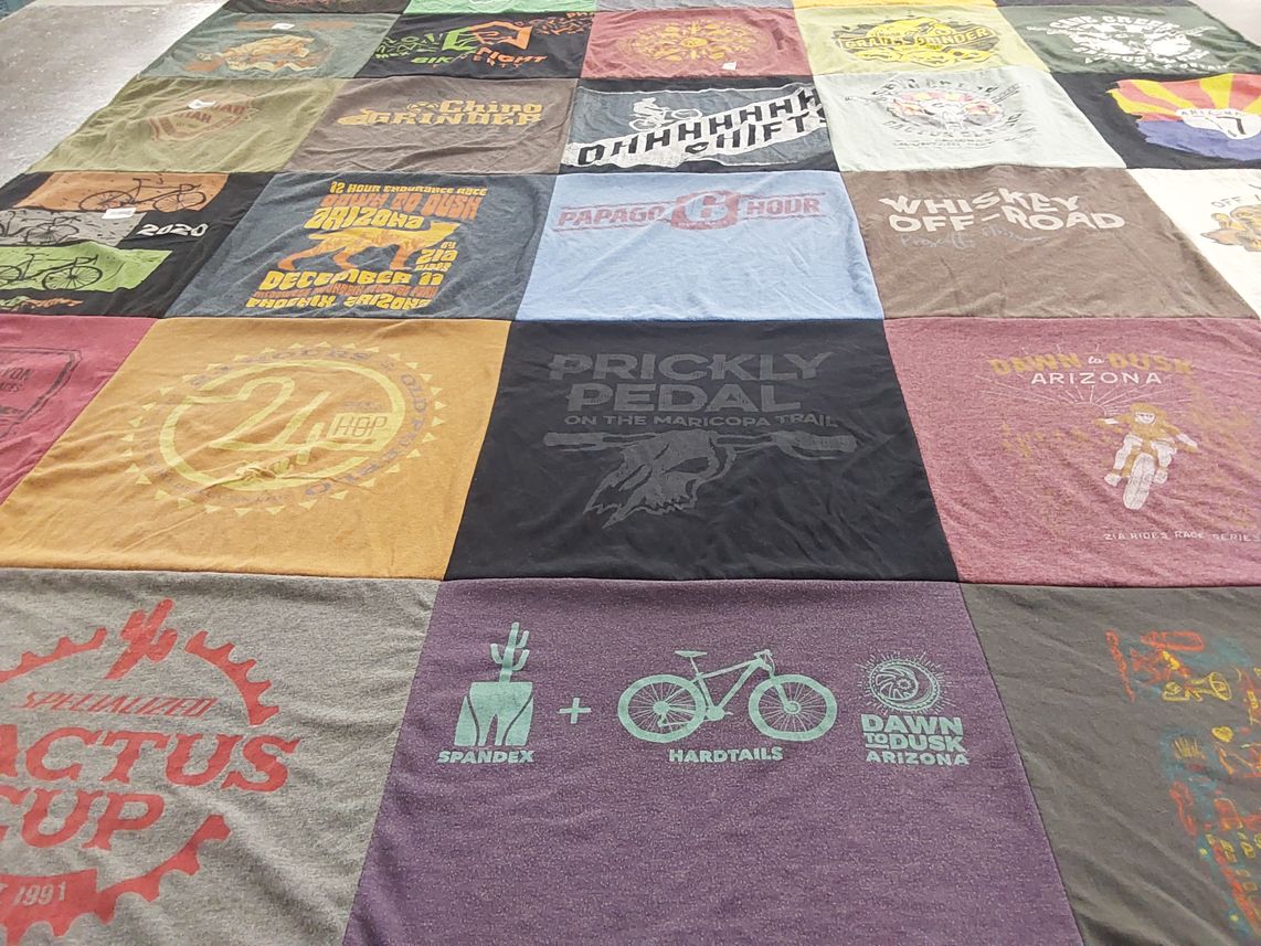T-shirt quilt with mountain biking, outdoor activities themes by Leslie from AZ