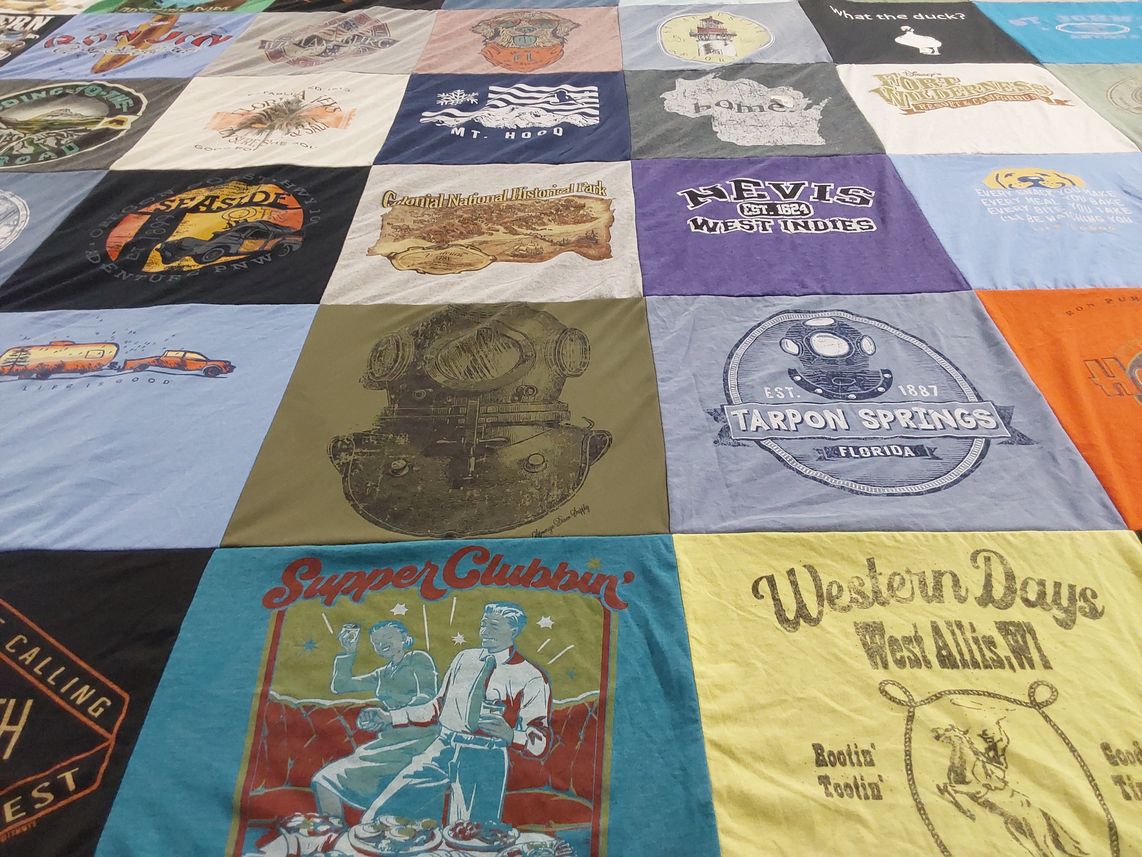 T-shirt quilt with travel, history themes by Diane from WI