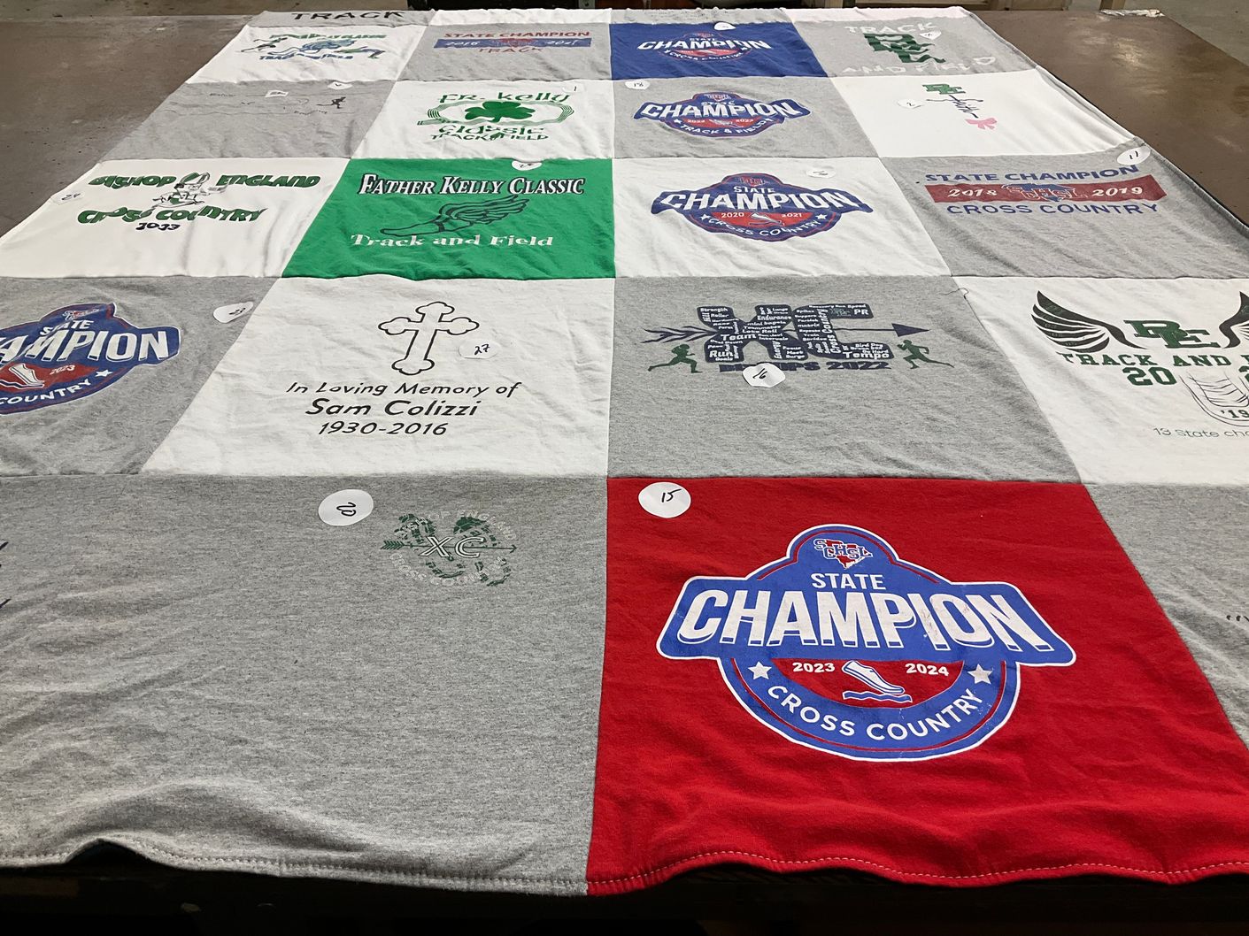 T-shirt quilt featuring bishop england high school track and field, bishop england high school cross country by Tony from SC