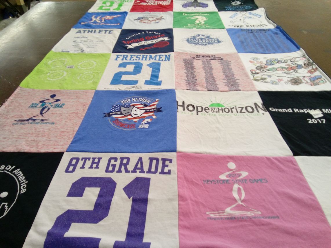 T-shirt quilt with athletics, ice skating themes by Erica from PA