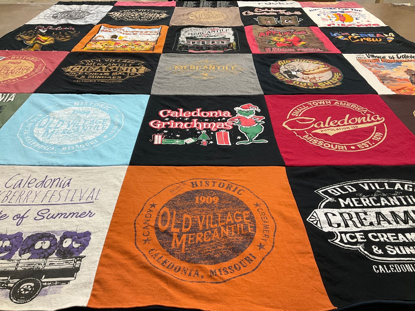 T-shirt quilt with local events, community themes by Randy from MO