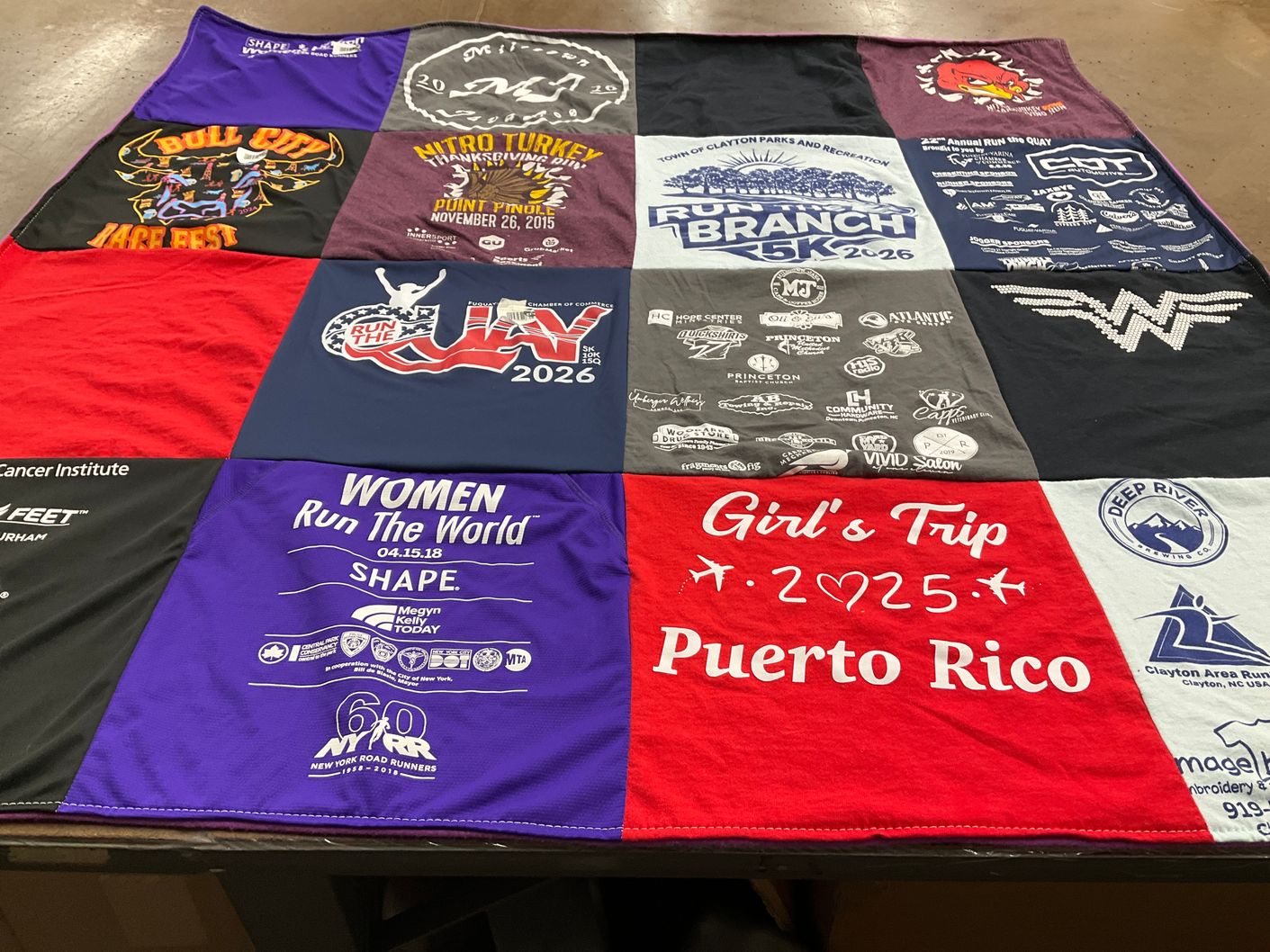 T-shirt quilt with running, travel themes by suifen from NC