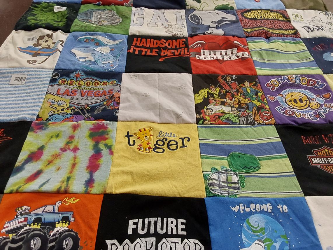 T-shirt quilt with cartoons, animals themes by SAMANTHA from CA