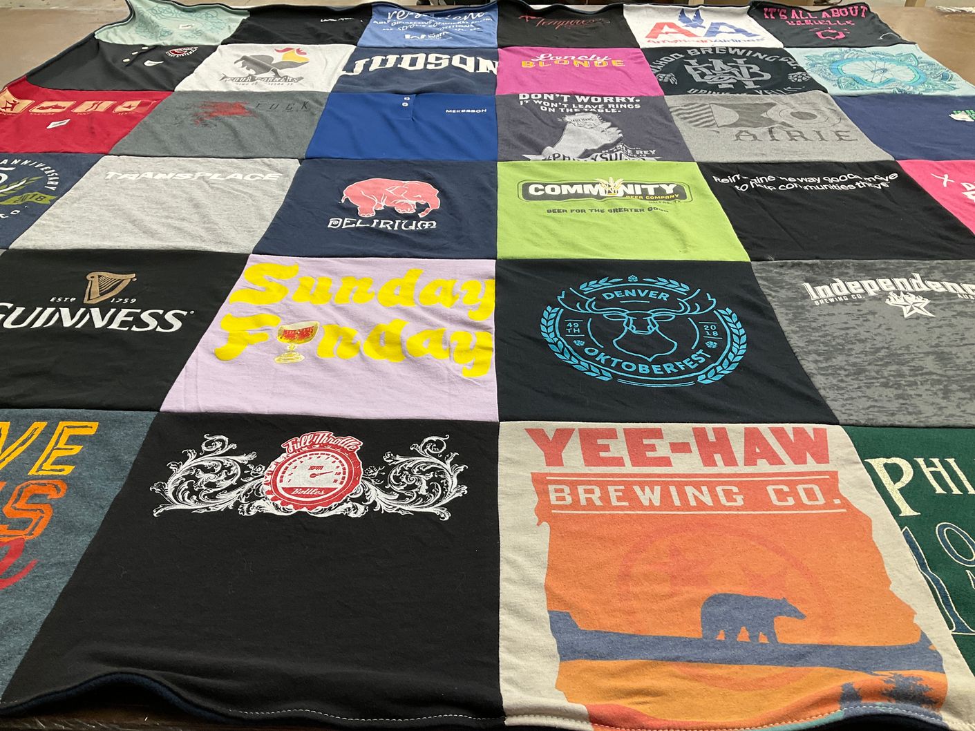 T-shirt quilt with craft beer, breweries themes by Danielle Hannifin from TX